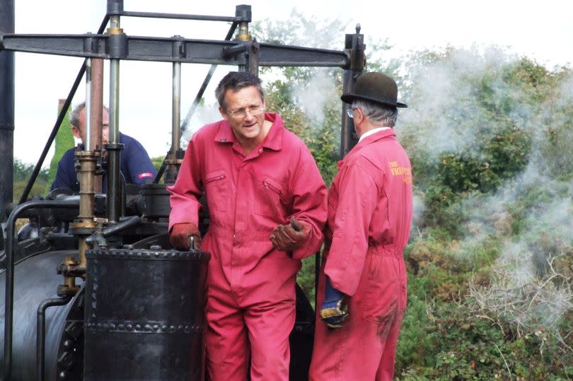 Dr Michael Mosley preparing to record a TV segment on a replica of Richard Trevithick's Puffing Devil in Cornwall with Philip Hosken, fellow author and former chairman of The Trevithick Society