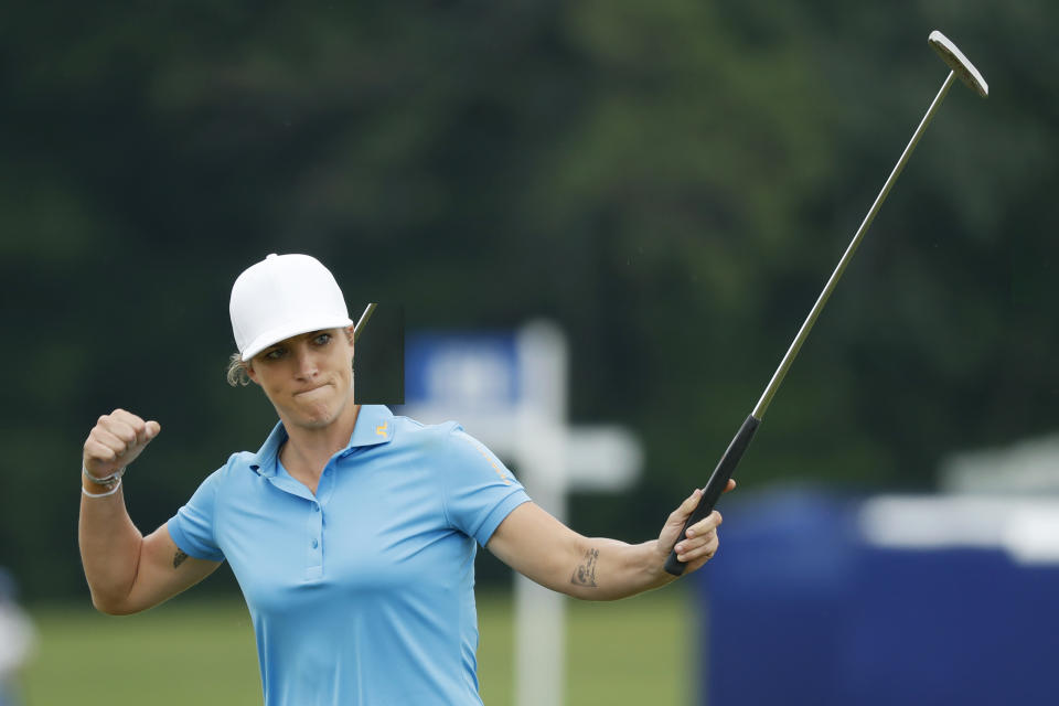 Mel Reid, of England, reacts after making her birdie putt on the 18th green during the final round of the KPMG Women's PGA Championship golf tournament, Sunday, June 23, 2019, in Chaska, Minn. (AP Photo/Charlie Neibergall)
