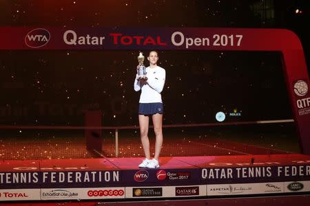 Tennis - Qatar Open - Women's Singles - Final Match - Karolina Pliskova of the Czech Republic v Caroline Wozniacki of Denmark - Doha, Qatar - 18/2/2017 - Karolina Pliskova holds her trophy. REUTERS/Ibraheem Al Omari