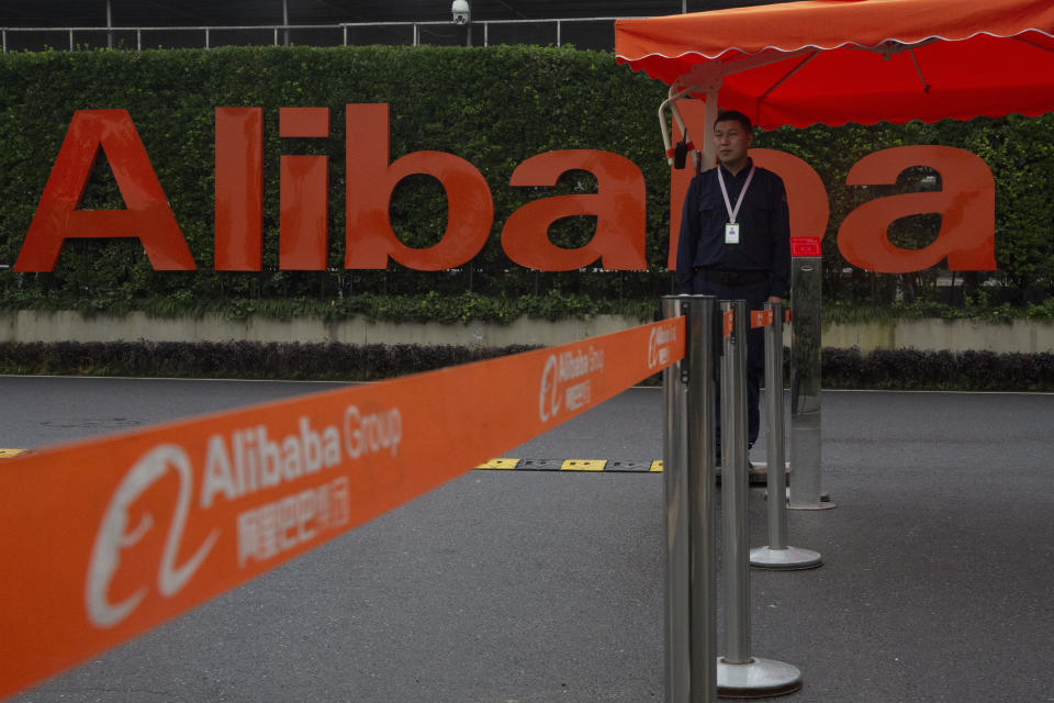 A security guard mans a checkpoint into the Alibaba Group headquarters in Hangzhou in eastern China's Zhejiang province on Friday, May 27, 2016. Chinese regulators on Thursday, Dec. 24, 2020 announced an anti-monopoly investigation of e-commerce giant Alibaba Group, stepping up official efforts to tighten control over China's fast-growing tech industries. (AP Photo/Ng Han Guan)