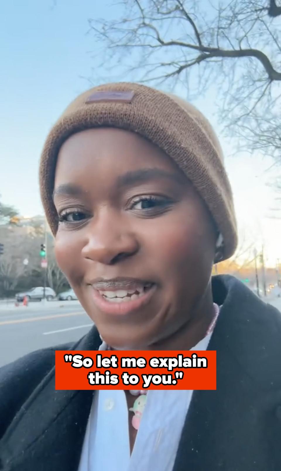 imani talking to the camera while walking down the street