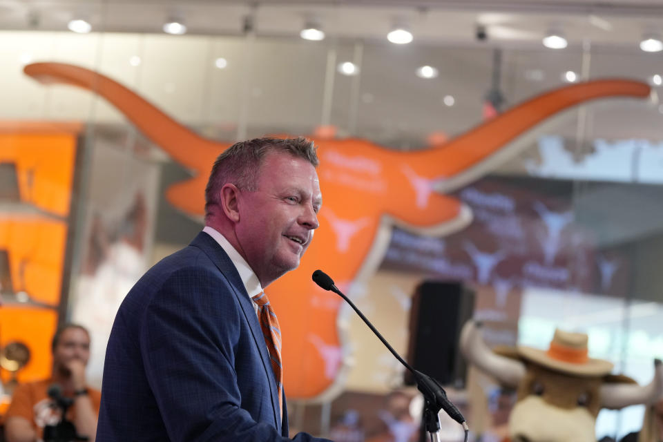 Jim Schlossnagle speaks at a news conference after he was introduced as the new NCAA college head baseball coach at Texas, Wednesday, June 26, 2024, in Austin, Texas. Schlossnagle left rival program Texas A&M. (AP Photo/Eric Gay)