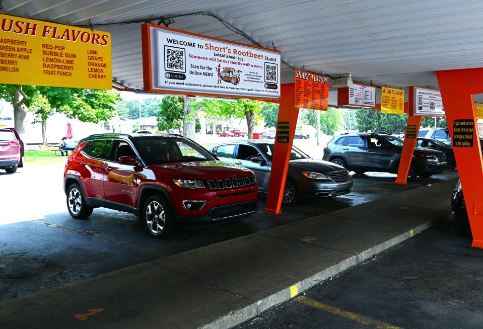 Menu boards hang under the canopy with all the options.