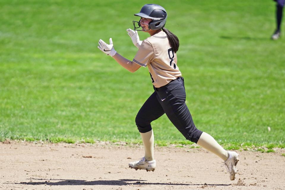 Gabriella Peralta celebrates on her way around the bases following her third-inning home run in North Kingstown's win over Bay View on Monday.