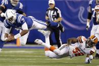 <p>Indianapolis Colts quarterback Jacoby Brissett (7) dives over Cleveland Browns outside linebacker Christian Kirksey (58) during the first half of an NFL football game in Indianapolis, Sunday, Sept. 24, 2017. (AP Photo/AJ Mast) </p>