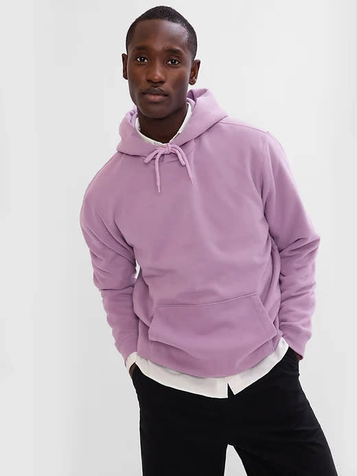 model wears lavender Vintage Soft Hoodie. Image via Gap.