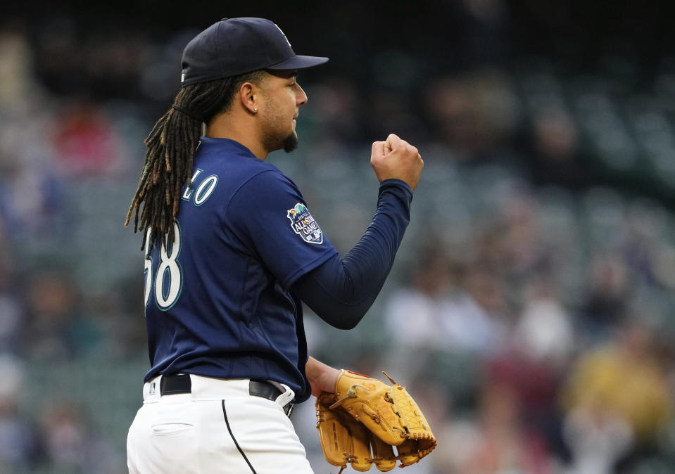 Seattle Mariners starting pitcher Luis Castillo reacts after striking out Oakland Athletics' Shea Langeliers for his 1,000th career strikeout during the fifth inning of a baseball game Monday, May 22, 2023, in Seattle. (AP Photo/Lindsey Wasson)