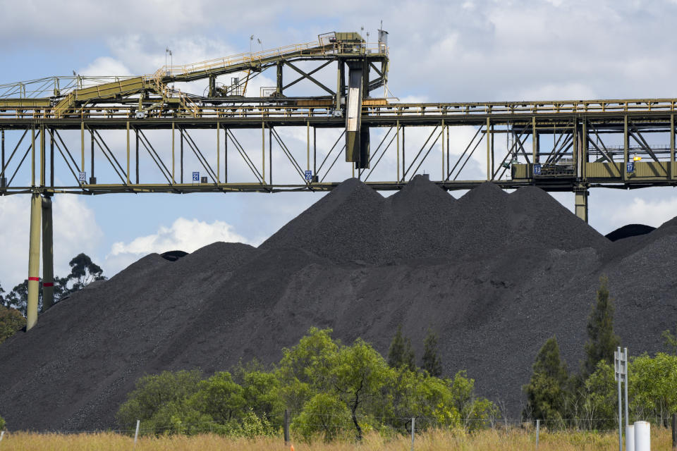 This shows a coal stack at a train loading facility near Muswellbrook in the Hunter Valley, Australia, Nov. 2, 2021. The Australian government, Thursday, Feb. 9, 2023, has for the first time rejected a coal mining application based on environmental law.(AP Photo/Mark Baker)