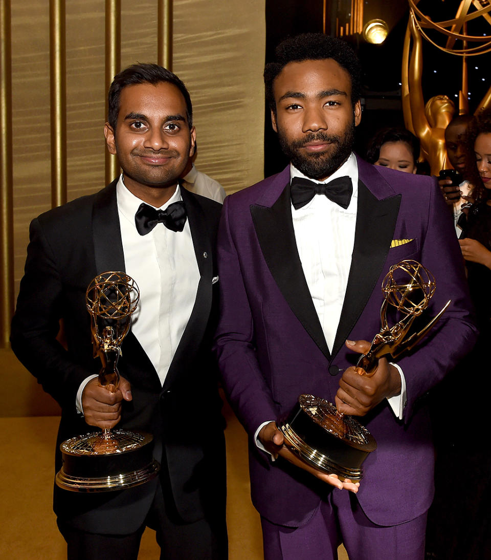 <p>Winners! Aziz Ansari, who was awarded an Emmy for Outstanding Writing for a Comedy Series for <em>Master of None</em>, compared hardware with Donald Glover, who won Outstanding Lead Actor in a Comedy Series for <em>Atlanta</em>, at the Governors Ball. (Photo: Kevin Winter/Getty Images) </p>