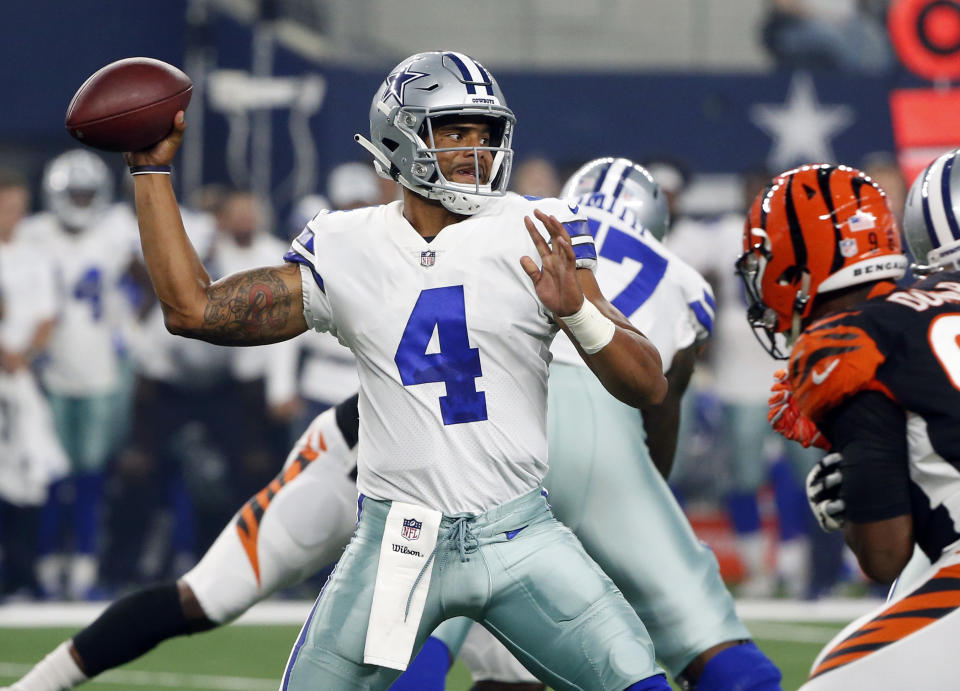 Dallas Cowboys quarterback Dak Prescott (4) looks to throw against the Cincinnati Bengals during the first half of a preseason NFL Football game in Arlington, Texas, Saturday, Aug. 18, 2018. (AP Photo/Michael Ainsworth)