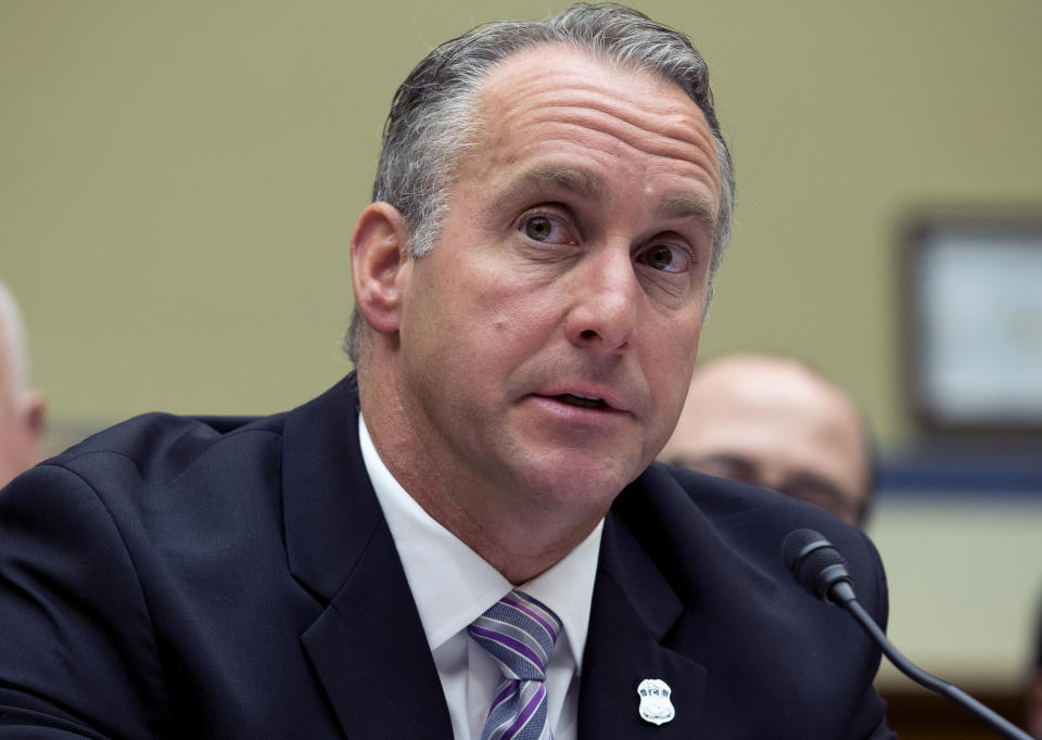 FILE - In this Oct. 30, 2019, file photo, Matthew Albence, acting director of the U.S. Immigration and Customs Enforcement testifies during House Oversight subcommittee hearing on Capitol Hill in Washington. Federal officials say the COVID-19 outbreak has unleashed a wave of fraud. “It’s incredibly rampant and it’s growing by the day,” Albence said. “We’re just scratching the surface of this criminal activity." (AP Photo/Jose Luis Magana, File)