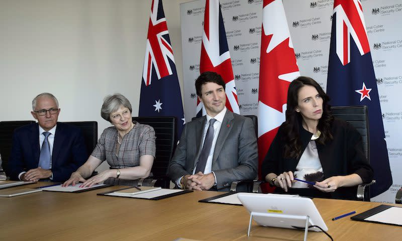 PHOTOS: Justin Trudeau meets with leaders in Lima, Paris and London