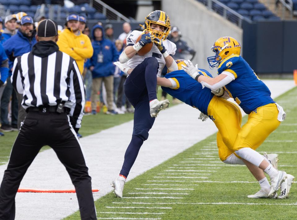 Kirtland’s Will Sayle makes a catch but it is called incomplete for coming down out of bounds during the fourth quarter against Marion Local, forcing a punt in the Division VI state final, Saturday, Dec. 3, 2022, at Tom Benson Hall of Fame Stadium.