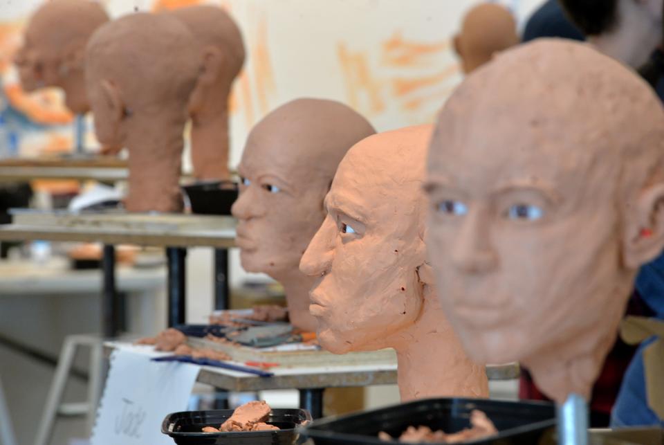 Sculptures near completion during the Forensic Skull Sculpture Workshop at Ringling College of Art and Design.