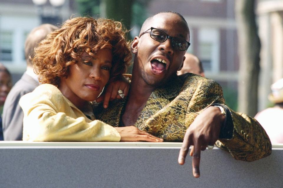 UNITED STATES - JUNE 12:  Whitney Houston is joined by her husband, singer Bobby Brown, at ceremonies in East Orange, N.J., where the Franklin School was renamed the Whitney E. Houston Academy of Creative and Performing Arts.  (Photo by Richard Corkery/NY Daily News Archive via Getty Images)