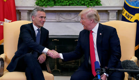 U.S. President Donald Trump meets with NATO Secretary General Jens Stoltenberg at the White House in Washington, U.S., May 17, 2018. REUTERS/Kevin Lamarque