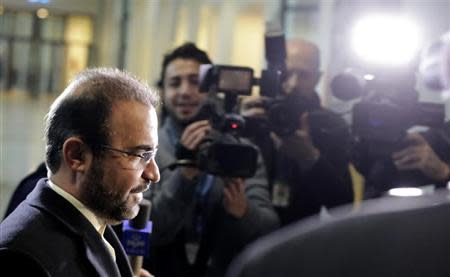 Iran's ambassador to the International Atomic Energy Agency (IAEA) Reza Najafi arrives for a meeting at the headquarters of the IAEA in Vienna December 11, 2013. EUTERS/Leonhard Foeger