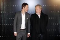 Michael Fassbender and director Ridley Scott as they arrive at the French premiere of the movie "Prometheus" in Paris, April 11, 2012.