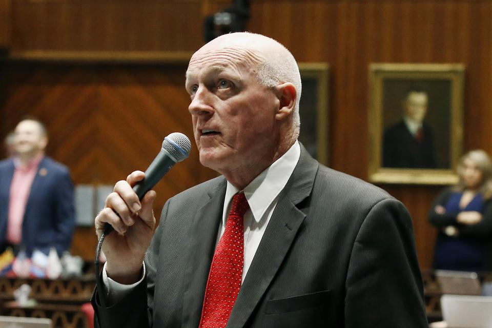 FILE - Arizona House Speaker Rusty Bowers, R-Mesa, offers up an amendment as lawmakers debate among three proposed laws that are designed to deal with distracted driving caused by cellphone use on the floor of the House of Representatives at the Arizona Capitol, in Phoenix, Wednesday, April 18, 2019. Bowers faces a primary challenge from a Donald Trump-endorsed candidate in former Arizona state Sen. David Farnsworth. (AP Photo/Ross D. Franklin, File)