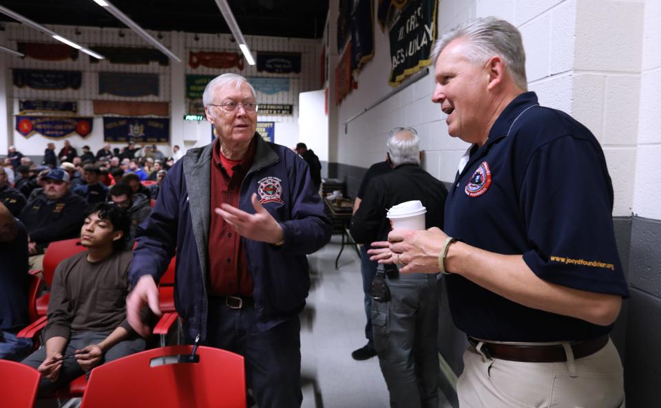 Gordon Wren Jr., retired Coordinator for Rockland Fire and Emergency Services, left, talks with Jeff Cool, retired FDNY firefighter at the Rockland County Fire Training Center in Pomona Feb. 20, 2023. Cool was seriously injured battling a fire in NYC where several firefighters died. He survived a four-story fall on Jan. 22, 2005 from a burning Bronx building filled with illegal rooms.