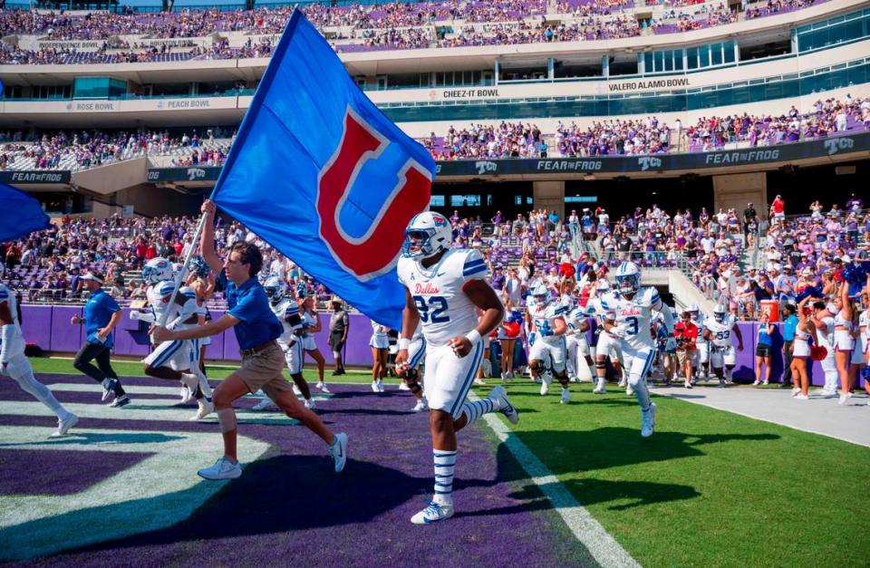 The SMU Mustangs take the field to face the TCU Horned Frogs in Fort Worth, Texas.