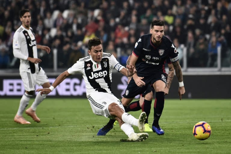 Juventus' Argentine forward Paulo Dybala (C) took just 44 seconds to score in Turin