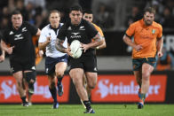 New Zealand's Codie Taylor makes a break during the Bledisloe Cup rugby test match between the All Blacks and the Wallabies at Eden Park in Auckland, New Zealand, Saturday, Sept. 24, 2022. (Andrew Cornaga/Photosport via AP)