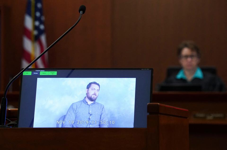 Judge Penney Azcarate listens to a previously recorded video deposition by Josh Drew, Raquel Pennington's ex-husband, during Johnny Depp's defamation trial against ex-wife Amber Heard at the Fairfax County Circuit Courthouse in Fairfax, Virginia, on May 18, 2022.