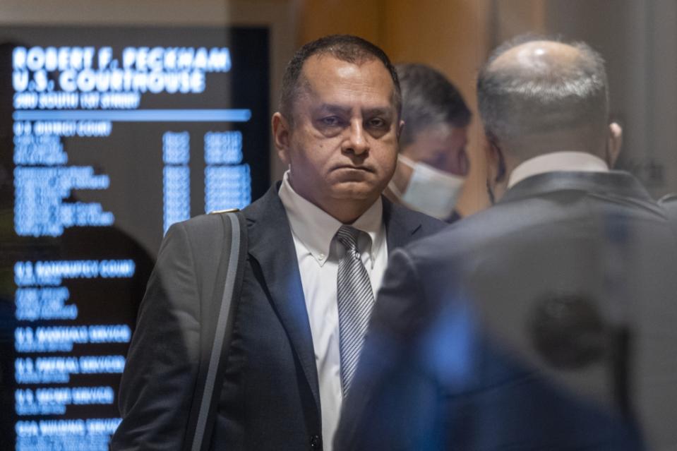 Sunny Balwani, former president of Theranos Inc., arrives at federal court in San Jose, California, U.S., on Wednesday, March 16, 2022. Opening arguments were reset from Tuesday to Wednesday for Balwani, who was Elizabeth Holmes's boyfriend while working as second-in-command at the blood-testing startup she founded. Photographer: David Paul Morris/Bloomberg via Getty Images