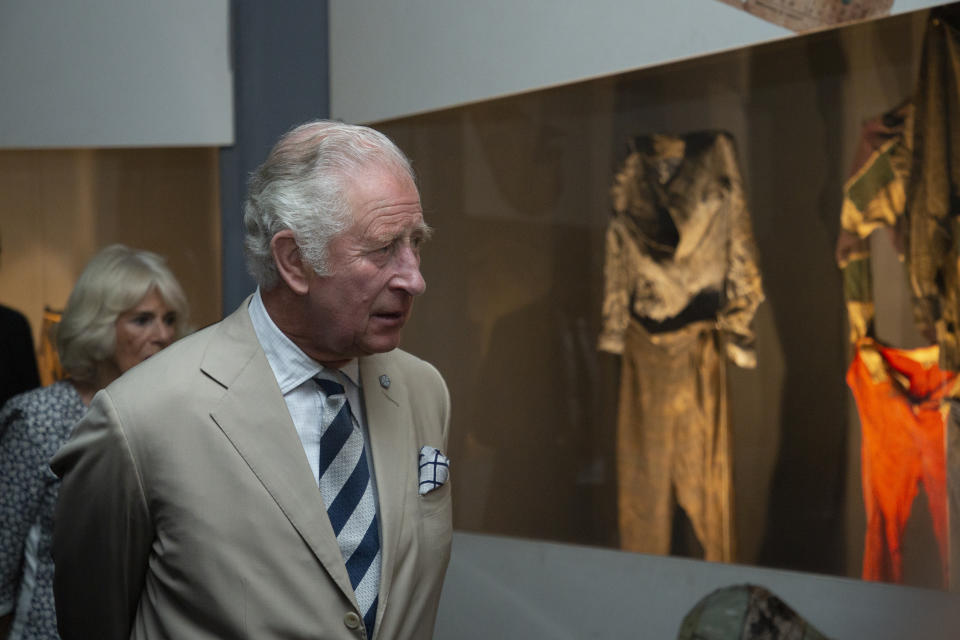 Britain's Prince Charles visits an exhibition of the personal effects of some of those who died, at the Kigali Genocide Memorial in the capital Kigali, Rwanda Wednesday, June 22, 2022. Prince Charles has become the first British royal to visit Rwanda, representing Queen Elizabeth II as the ceremonial head of the Commonwealth at a summit where both the 54-nation bloc and the monarchy face uncertainty. (AP Photo)