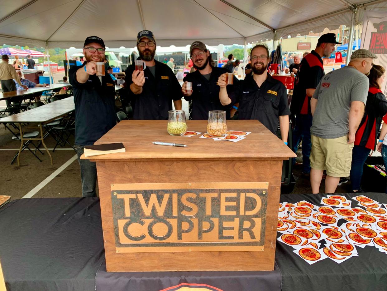 From left, Forrest Cheney, Dave Weaverling, Jonathon Hatcher and Brett McDavid of Twisted Copper, Mt. Pleasant's newest brewery, previews their beers prior to opening later this year at the second annual Columbia Oktoberfest.