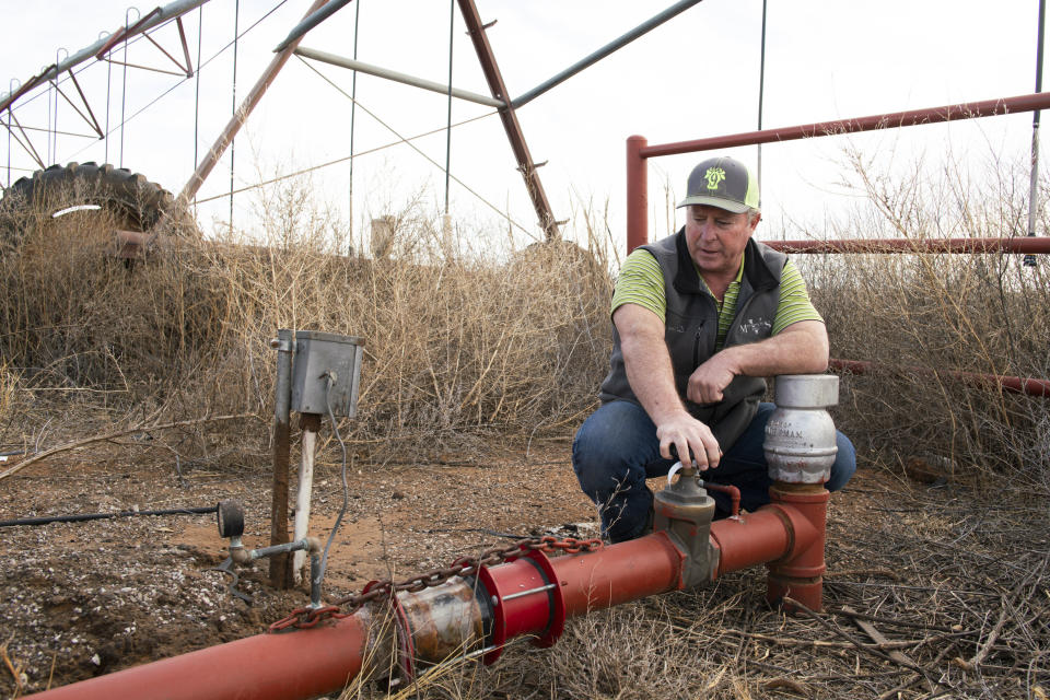 Art Schaap at the most contaminated of his wells, just outside the fence of Cannon Air Force Base. (Photo: Don J. Usner for Searchlight New Mexico)