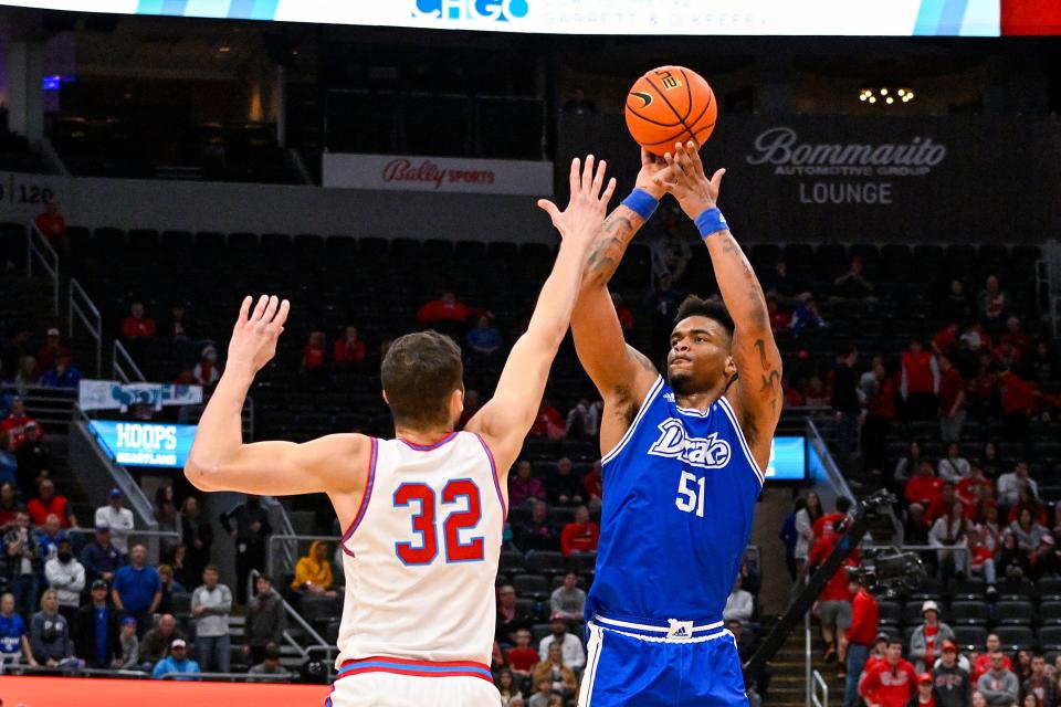 Drake Bulldogs forward Darnell Brodie (51) shoots against Bradley Braves forward Ahmet Jonovic (32) during the second half in the finals of the Missouri Valley Conference Tournament.