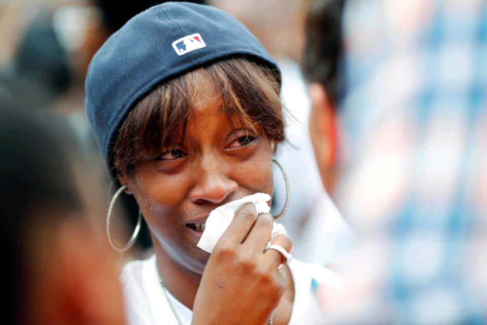 Diamond Reynolds, girlfriend of Philando Castile, weeps as people gather to protest the fatal shooting of Castile by Minneapolis area police during a traffic stop.&nbsp; (Photo: Adam Bettcher / Reuters)