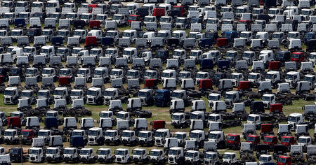 FILE PHOTO: New Ford trucks are seen at a parking lot of the Ford factory in Sao Bernardo do Campo, Brazil, February 12, 2015. REUTERS/Paulo Whitaker/File Photo