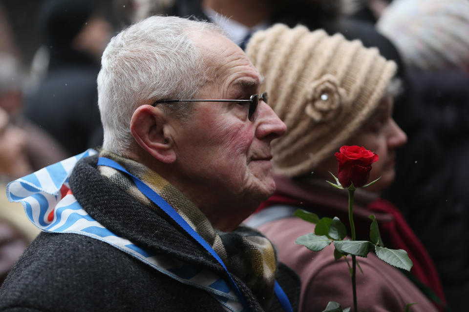 Members of an association of Auschwitz concentration camp survivors arrive to lay wreaths and flowers at the execution wall at the former Auschwitz I concentration camp on January 27, 2015 in Oswiecim, Poland. International heads of state, dignitaries and over 300 Auschwitz survivors are attending the commemorations for the 70th anniversary of the liberation of Auschwitz by Soviet troops on 27th January, 1945. Auschwitz was among the most notorious of the concentration camps run by the Nazis during WWII and whilst it is impossible to put an exact figure on the death toll it is alleged that over a million people lost their lives in the camp, the majority of whom were Jewish.