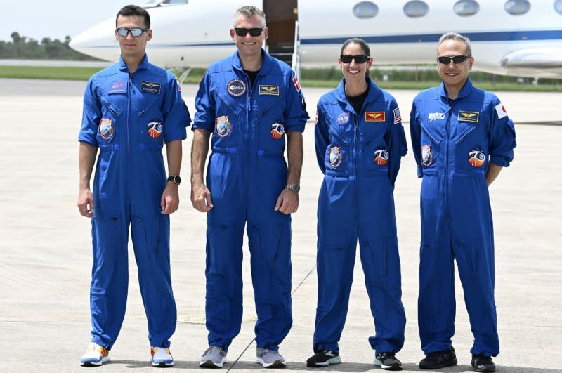 From left, NASA's Crew 7, Roscosmos cosmonaut Konstantin Borisov, ESA astronaut Andreas Morgensen, NASA astronaut Jasmin Moghbeli and Japanese Space Agency astronaut Satoshi Furukawa pose on the tarmac at Kennedy Space Center on Sunday after arriving aboard a Gulf Stream jet piloted by Borisov. Photo by Joe Marino/UPI