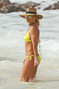 <p>Is the pop superstar trying to tell us something? Brit, who showed off her fit physique in a bright yellow bikini, seemed to be wearing a ring on her left hand and has people wondering if she and <a rel="nofollow" href="https://www.yahoo.com/lifestyle/britney-spears-tells-her-apos-125707770.html" data-ylk="slk:boyfriend Sam Asghari;elm:context_link;itc:0;sec:content-canvas;outcm:mb_qualified_link;_E:mb_qualified_link;ct:story;" class="link  yahoo-link">boyfriend Sam Asghari</a> have taken things to the next level. The pair celebrated their first anniversary in late November and appear to be inseparable. Could the third time be the charm for the mother of two? Stay tuned. (Photo: BackGrid) </p>