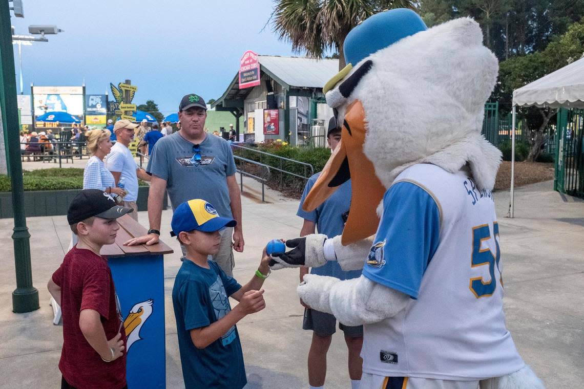 At Ticketreturn.com Field, the Myrtle Beach Pelicans attract fans by providing food and entertainment options beyond the baseball game. June 30, 2021. JASON LEE