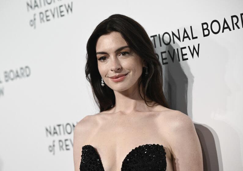 Anne Hathaway, in black sequin gown, at the National Board of Review Awards Gala on Jan. 11, 2024, in New York