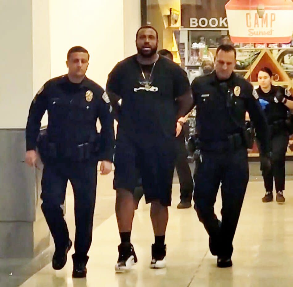 PREMIUM EXCLUSIVE Please contact X17 before any use of these exclusive photos - x17@x17agency.com Saturday, July 9, 2022 - NFL offensive lineman Duane Brown was nabbed by TSA security after allegedly trying to board an aircraft with a stolen firearm. The 6'4" 315 pound free agent is spotted being escorted to an awaiting vehicle by several police officers. Brown has been wreaking havoc on defenses since 2008 and the free agent last played for the 2021 Seattle Seahawks. Depending on the potential charges, Brown may have very well played his last snap in the NFL. X17online.com