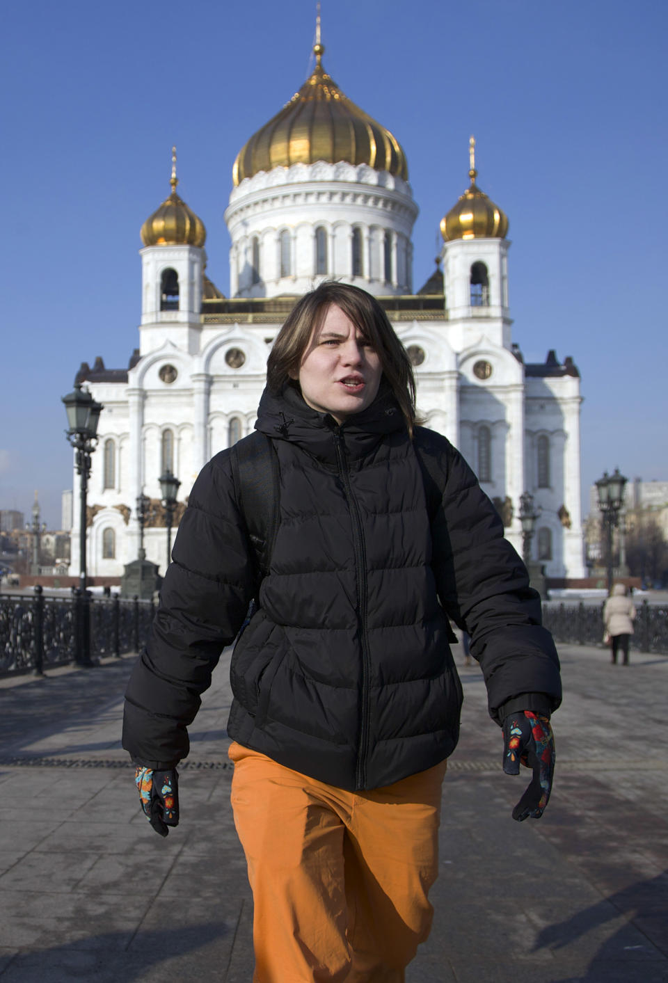 Member of the Pussy Riot punk band Yekaterina Samutsevich, in front of the Christ the Savior Cathedral, a year after their performance, in Moscow, Russia, Thursday, Feb. 21, 2013. Yekaterina Samutsevich told the AP on Thursday that she is glad that their punk performance in Christ the Savior Cathedral on Feb. 21, 2012, made Russians more aware of the Orthodox Church’s increasingly close ties with the Russian government. Samutsevich, Maria Alekhina and Nadezhda Tolokonnikova were sentenced to two years in prison for hooliganism motivated by religious hatred, drawing protests around the world about Russia’s intolerance of dissent. Samutsevich was later released on appeal. (AP Photo/Ivan Sekretarev)