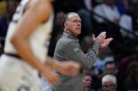 TCU coach Jamie Dixon applauds during the first half of the team's second-round college basketball game against Gonzaga in the men's NCAA Tournament on Sunday, March 19, 2023, in Denver. (AP Photo/John Leyba)