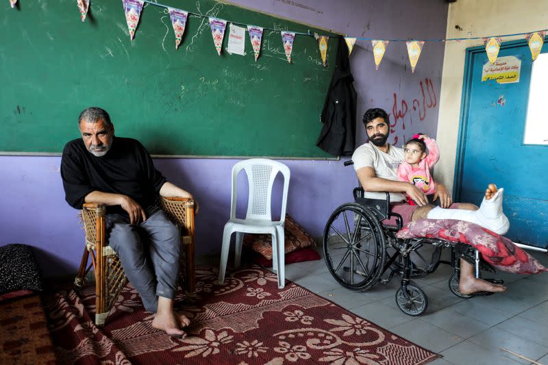 Displaced Palestinian Abu Alkas family take shelter in a school, in Gaza City