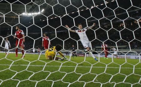 Germany's Marco Reus celebrates a goal of team mate Max Kruse (not pictured) against Georgia during their Euro 2016 Group D qualifying soccer match against Germany in Leipzig, Germany October 11, 2015. REUTERS/Fabrizio Bensch