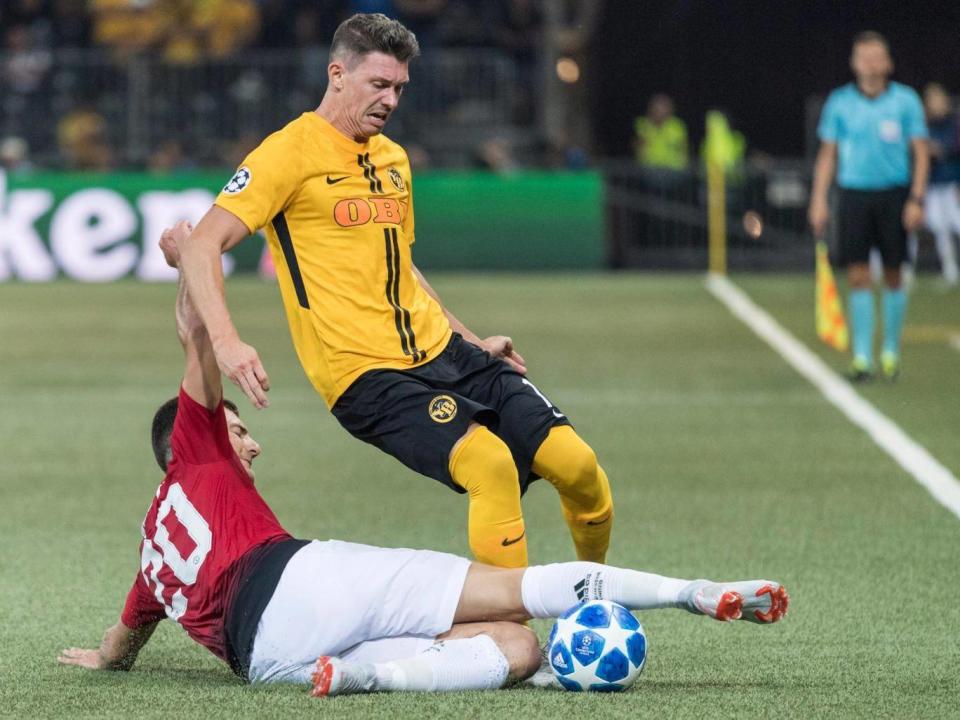 Diogo Dalot tackles Young Boys’ Christian Fassnacht (EPA)