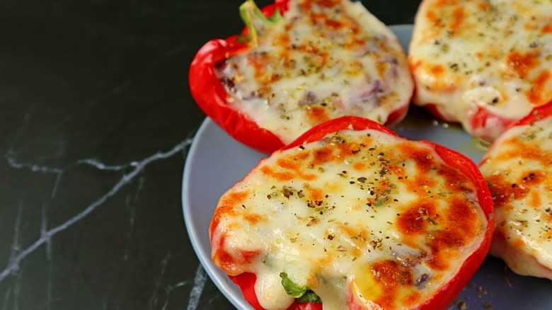 stuffed peppers topped with cheese