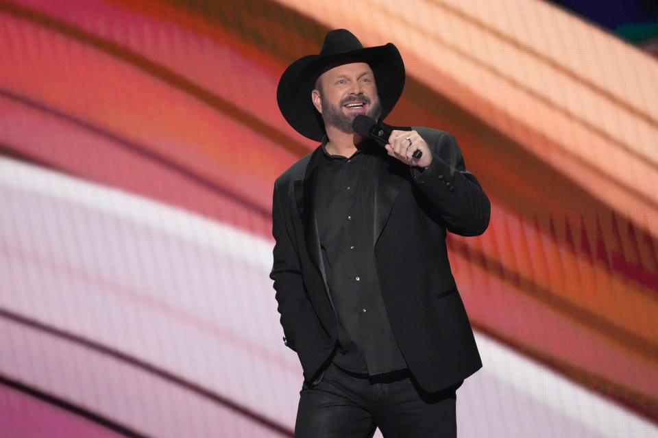 Garth Brooks, pictured at the 2023 Academy of Country Music Awards, is opening a honky-tonk on Broadway in Nashville