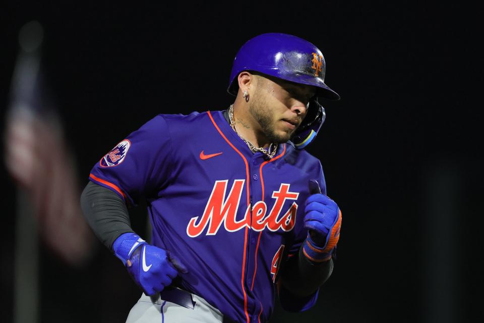 New York Mets catcher Francisco Alvarez (4) circles the bases after hitting a home run against the Miami Marlins during the fourth inning at Roger Dean Chevrolet Stadium on March 8, 2024, in Jupiter, Fla.