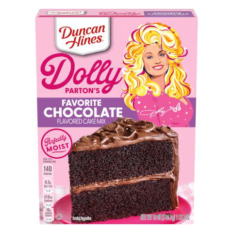 <p>Duncan Hines</p> Dolly Parton and Duncan Hines chocolate cake mix.